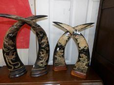 4 ornamental cow horns.