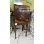 An Edwardian mahogany inlaid pot cupboard.