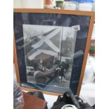 A framed and glazed large photograph