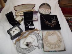 A mixed lot of necklaces including pearls etc.