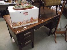 An industrial oak double pedestal desk, (collect only).