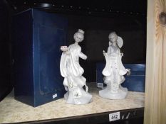 2 boxed Cascade Geisha figures.