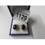 A pair of yellow gold substantial sapphire and diamond earrings, aproximately 4 ct's.