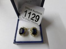 A pair of yellow gold substantial sapphire and diamond earrings, aproximately 4 ct's.