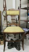 An Edwardian mahogany inlaid bedroom chair.