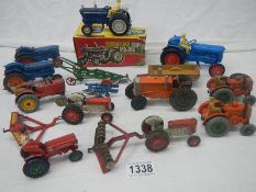 A mixed lot of die cast tractors and farming implements by Britain's, Dinky, Corgi etc.