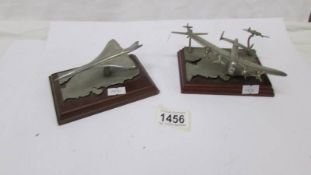 A pewter 'The Battle of Britain Fly Past' diorama and another pewter aircraft.