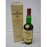 An unopened bottle fo Glenlivet whisky.