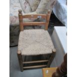 A string seat childs chair