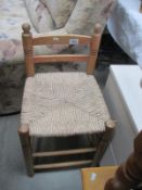 A string seat childs chair