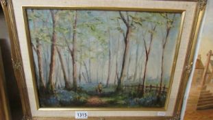 An oil on board painting 'Bluebells in Bolney Woods', signed David K Wilson, 1985.
