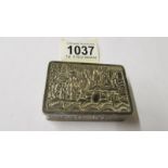 An embossed silver snuff/trinket box, 119.3 grams.