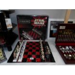 A boxes Star Wars Episode 1 chess set (1 Obi Wan Kanobe light sabre broken or missing).
