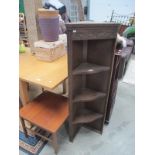 A corner shelf unit and a coffee table