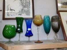 6 items of coloured glass including tall blue vase, tall yellow glass, tall grey vase, green bowl,