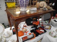 A dark wood coffee table with glass inset top.