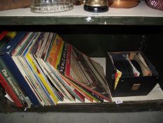 A quantity of 45 rpm and LP records.