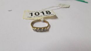 A diamond old cut five stone ring, platinum set, gold shank, size J.