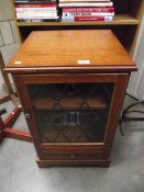 A medium oak cabinet with leaded glass panel (collect only)