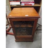 A medium oak cabinet with leaded glass panel (collect only)