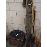 3 old fishing rods with tackle and basket.