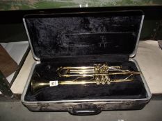 A cased Besson Blessing Scholastic trumpet, no mouthpiece.