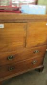 A mahogany 2 door 2 drawer cabinet with fold over top. (collect only).