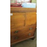 A mahogany 2 door 2 drawer cabinet with fold over top. (collect only).