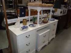 A 4 piece white bedroom set comprising dressing table, chest of drawers, stool etc., (collect only).