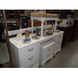 A 4 piece white bedroom set comprising dressing table, chest of drawers, stool etc., (collect only).