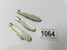 3 silver and mother of pearl pocket knives.