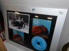 A framed and glazed CD/picture collages - Taylor Hawkins and the Cocktail Riders,