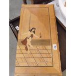 An erotic inlaid backgammon board.