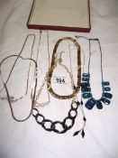 7 assorted necklaces.