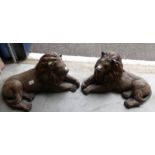 A pair of reclining lion garden ornaments (collect only).