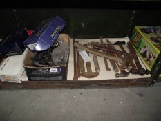 A quantity of old hammers and various door handles.