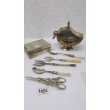 A silver plate sugar scuttle with scoop, a silver plate cigarette box and assorted flatware.