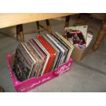 A large quantity of LP records including country, Status Quo, Liberace etc.