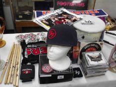 A very good collection of mainly Foo Fighters ephemera including many signed items, pictures,