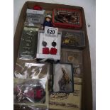 A mixed lot including Wade badge, coin pendant. etc.