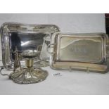 An early 20th century silver plate chamber candlestick and a silver plate tureen.