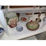 A collection of pottery and porcelain including Sairey Gamp jug, hen egg nest, blur & white etc.