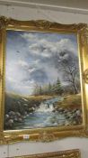 A gilt framed oil on canvas mountain stream scene, signed but indistinct, image 60 x 76 cm.