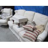 A 3 seater settee with matching arm chair and a pouffe