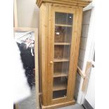 A pine cupboard with glazed door. (collect only).