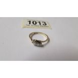 A circa 1940's 3 stone diamond ring, platinum set and gold shank, size N.