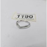 An 18ct white gold 16 stone diamond wishbone ring, size M.