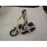 An Evil Knievel 1970's doll and bike.