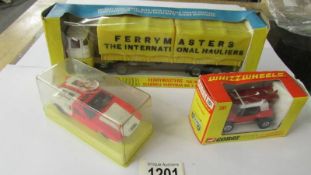 A boxed Corgi 1147 Scammell Ferry Masters truck, A 381 G.P Beach Buggy and a Dinky Detomaso.