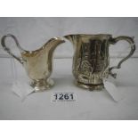 2 hall marked silver jugs, 233 grams.